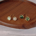 Gold Tone Round Faceted Stone Stud Earrings In Green And Ivory view 1