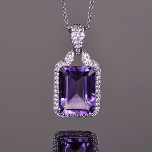 Silver Tone Purple Rectangle Crystal Pendant Necklace shown from the front