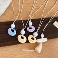 Oval Resin Pendant Necklaces in Five Soft Color Options view 2