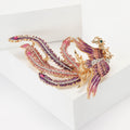 Jeweled Long Tail Phoenix Brooch With Faceted Crystals And Polished Metal Details view 3