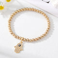 Gold Tone Beaded Teardrop Evil Eye and Hamsa Charm Bracelets view 3