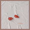 Red Translucent Resin Seed Shaped Stud Earrings Pair view 4