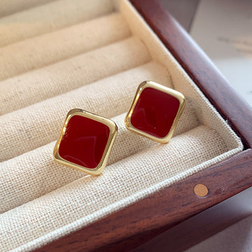 Gold Tone Square Stud Earrings with Deep Red Centers