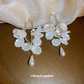 White Floral Shell and Pearl Drop Earring Collection view 3