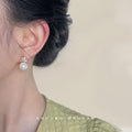 White Pearl Gold Butterfly Wing Stud Earrings Pair view 2