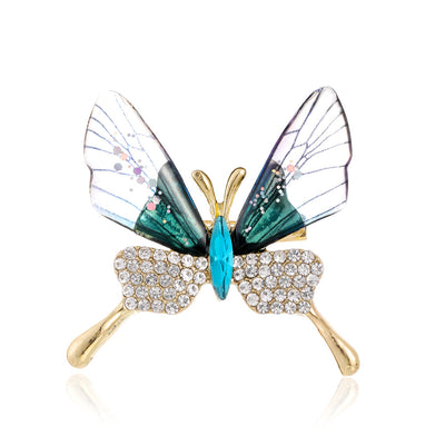 Front product view of the butterfly brooch pin in silver and gold