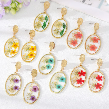 Gold Tone Oval Clear Resin Pressed Flower Drop Earrings