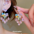 Pink Heart Crystal Floral Cluster Stud Earrings with Polished Metal Details view 2