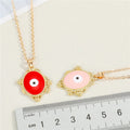 Gold Tone Ornate Oval Evil Eye Pendant Necklaces in Six Colors view 4