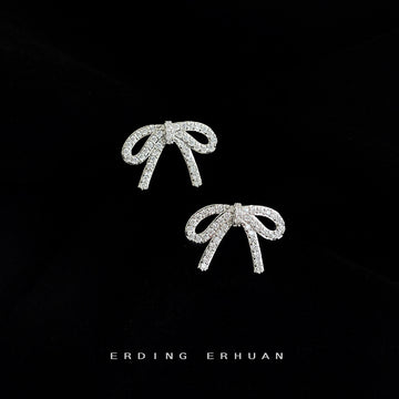 Silver Tone Clear Stone Ribbon Bow Stud Earrings With Pave Finish