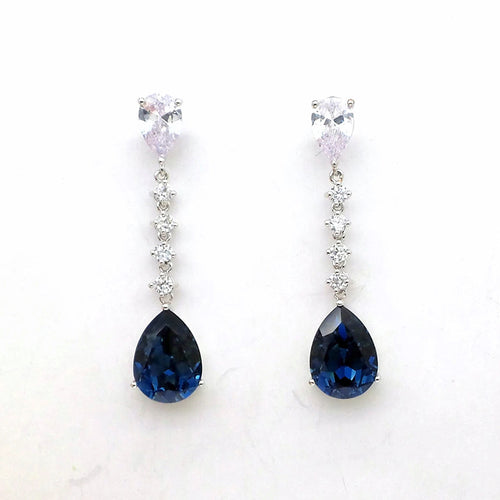 Silver clear and blue teardrop drop earrings pair front view on white