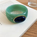 Acrylic Wide Bangle with Oval Gold-Framed Cabochon view 9