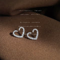 Silver Tone Hollow Heart Stud Earrings with Clear Crystal Pave view 3