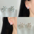 Petite Bow Stud Earrings In Pink And Blue Enamel Finishes view 1