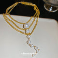Gold Layered Pearl Drop Necklace with Graduated Chain Strands view 2