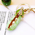Enamel Pea Pod and Mixed Auspicious Motif Keychains view 1
