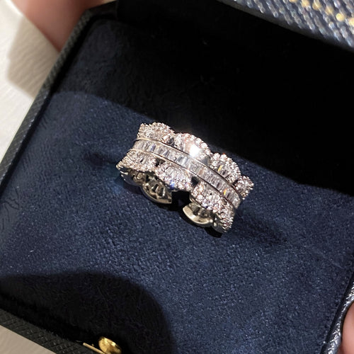 Silver multi-row crystal ring in navy jewelry box