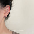 Silver Hollow Flower Stud Earrings Opalescent Oval Crystal view 2