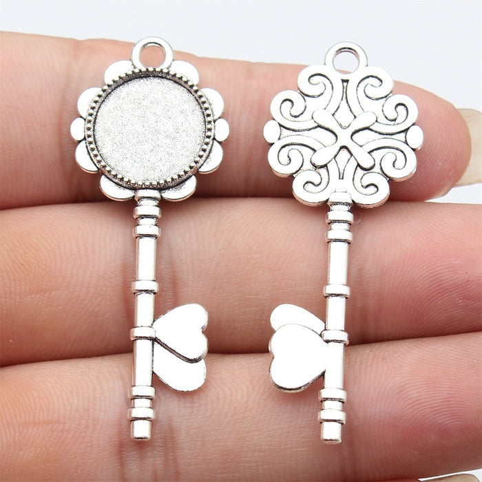 Ornate Key Shaped Round Cabochon Tray Metal Pendants