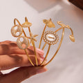 Sea Life Open Bangle Collection in Seven Metal Styles view 4