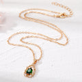Gold Tone Crystal Teardrop Pendant Necklaces in Green Red and Clear view 4