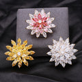 Layered Snowflake Brooch A Layered Pointed Crystal Flower Or Snowflake In A Gold-Tone view 1