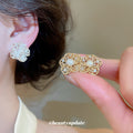 Filigree Flower Pearl Clip-On Earrings with Polished Metal Details view 2