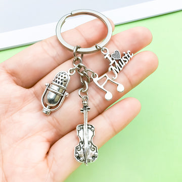 Guitar, Music Note and Microphone Charm Keychains in 19 Pictured Variations