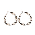 Twisted Metal Hoop Earrings in Gold Tone and Silver Tone view 5