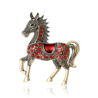 Front view of the running horse crystal brooch in red gold and blue silver brooch and its color options