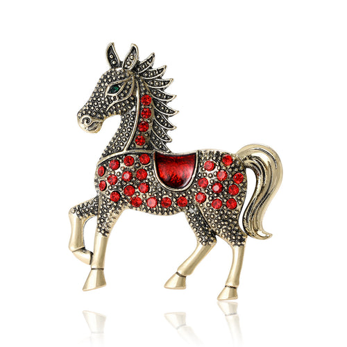 Front view of the running horse crystal brooch in red gold and blue silver brooch and its color options