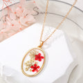 Gold Tone Oval Resin Pressed Flower Pendant Necklaces in Six Colors view 3