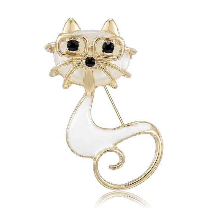 Cat With Glasses Brooch In Metal With Black Or White Enamel And A Curled Gold-Tone Tail