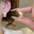 Gold Tone Bow Wide Hoop Earrings in Three Enamel Colors view 4