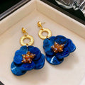 Black Leopard Floral Resin Drop Earrings with Polished Details view 6