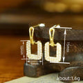 Open Square Crystal Drop Huggie Earrings in Gold Tone view 4