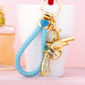 Gold Tone Revolver Keychain with Clear Crystal Grip Panels view 4