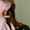 Amber Brown Resin Hoop Earrings With White Tiger Motif view 4