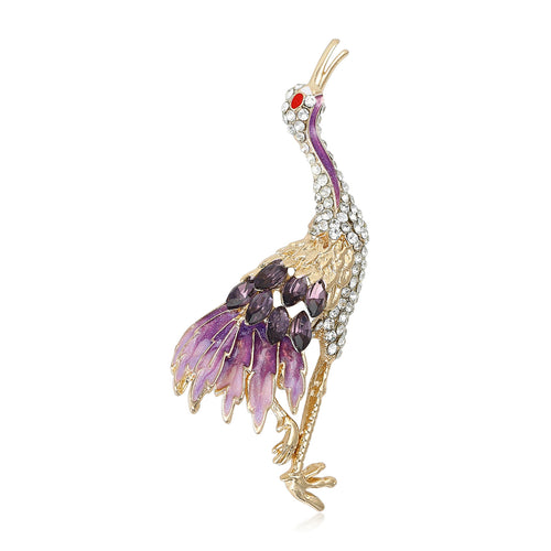 Angled close-up showing crystals on the colorful long leg crane brooch