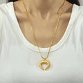 Twisted Crescent Horn Pendant Necklaces Gold Chain and Cord view 1