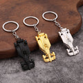 Open-Wheel Race Car Metal Keychain in Black, Gold, and Silver view 1