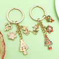 Christmas Charm Keychains Featuring Red Blossom Across 81 Pictured Variations view 2