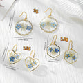 Gold Tone Blue Pressed Flower Drop Earrings in Three Geometric Shapes view 4
