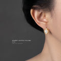 Gold Oval Pearl Frame Micro Crystal Stud Earrings Pair view 2