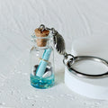 Blue Glass Message Bottle and Shell Split-Ring Keychain view 1