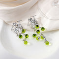 Green Grape Bead and Silver Leaf Asymmetrical Earrings view 1