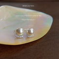 White Pearl Stud Earrings Silver Crescent Pavé CZ Base view 1