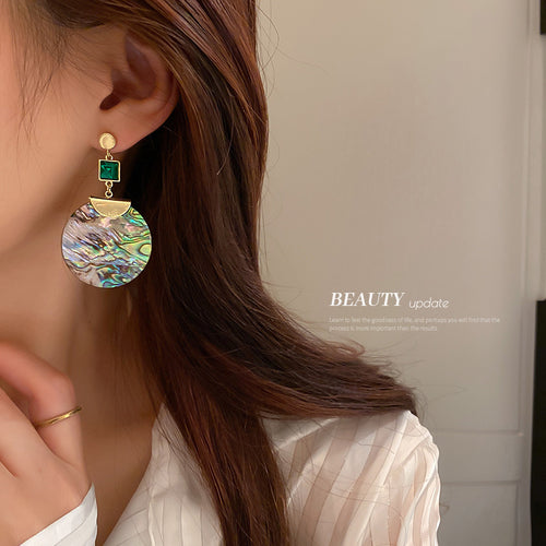 Green Square Stone Shell Pattern Disc Statement earrings in a on-ear view
