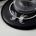 Silver Tone Purple Center Angel Wing Stud Earrings view 3