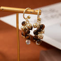 Brown Tiger Eye Look Bead Cluster Gold Tone Hoop Earrings view 2